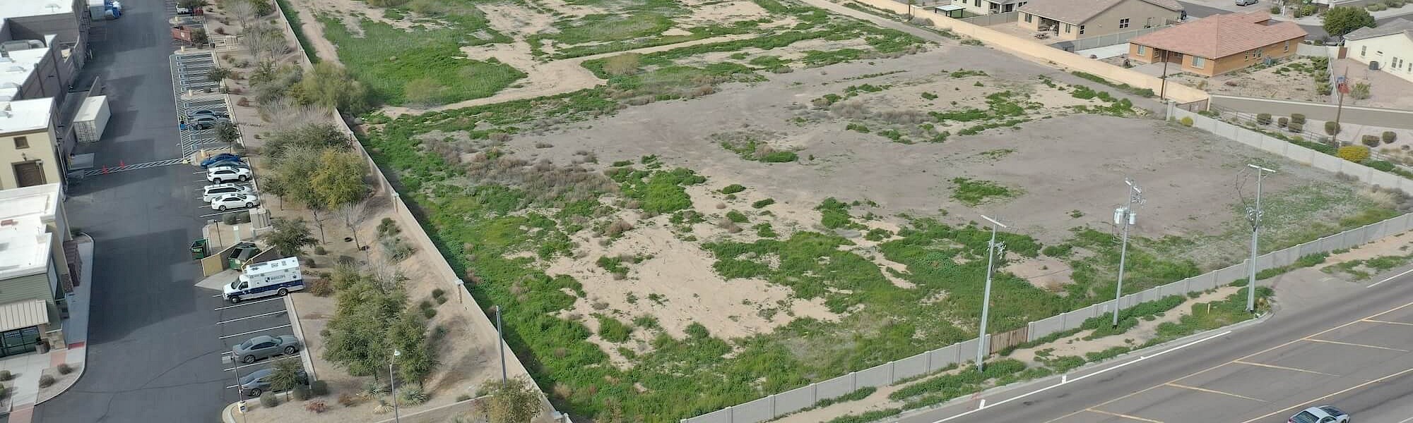 Aerial view of undeveloped land plots to be used in new luxury lease developments.